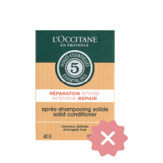 Bottle of L'occitane Solid Conditioner indicating it's NOT approved